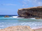  S atop the giant rock on the other side of the cove; curious marking on foreground rock