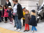  Multi-ethnic school kids waiting to cross a street in the international city of Geneva