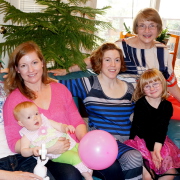  One grandma, three mothers, four daughters, two grandkids, and a pink balloon